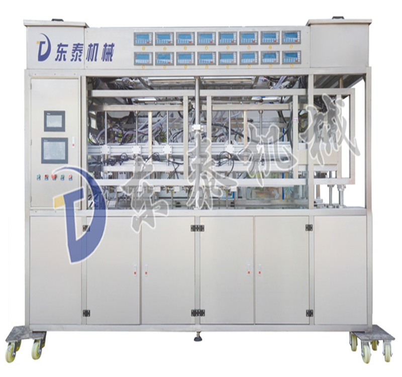 全自動稱重式灌裝機(jī).jpg 全自動稱重式灌裝機(jī).jpg